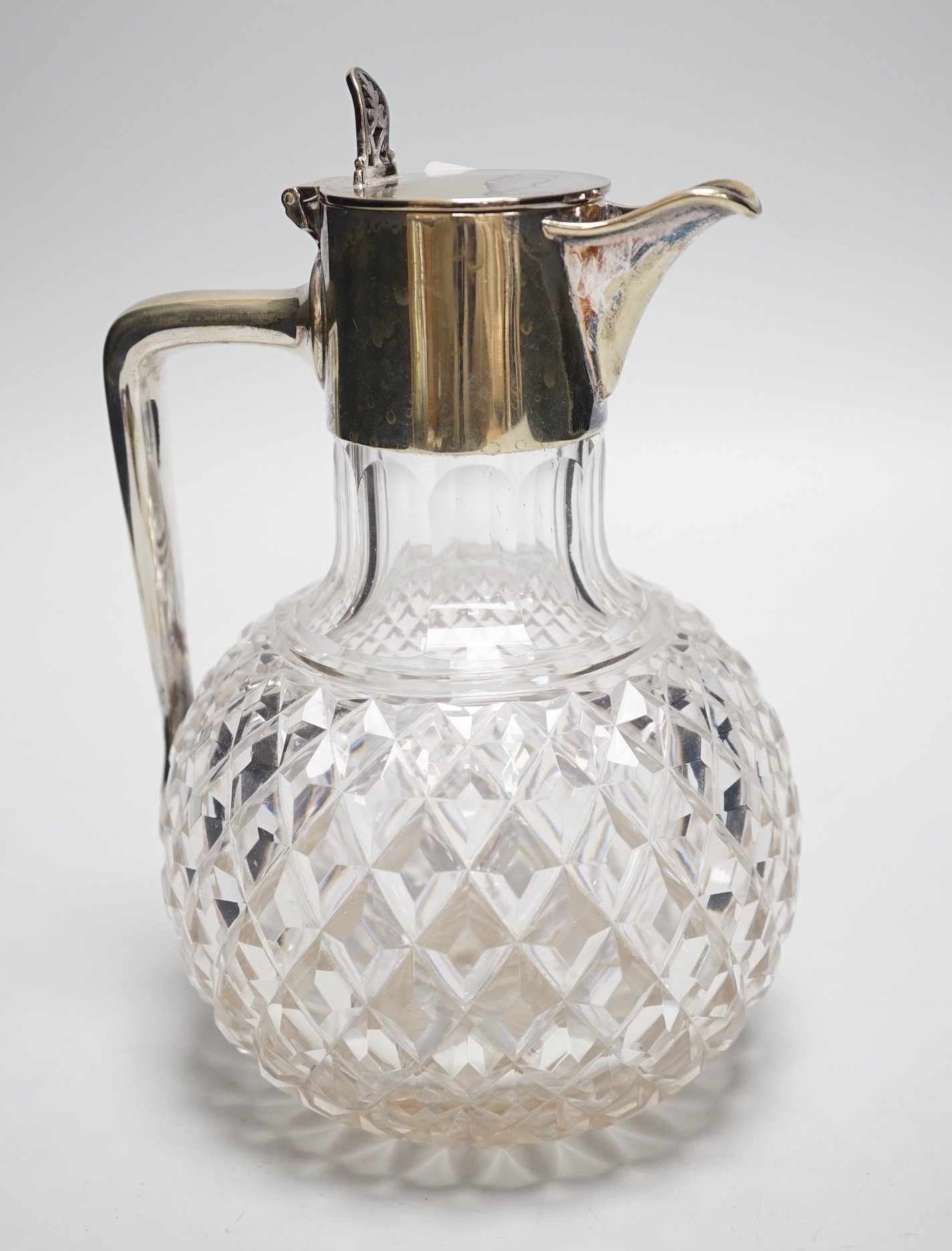 A Victorian electroplate mounted claret jug, 18cms high